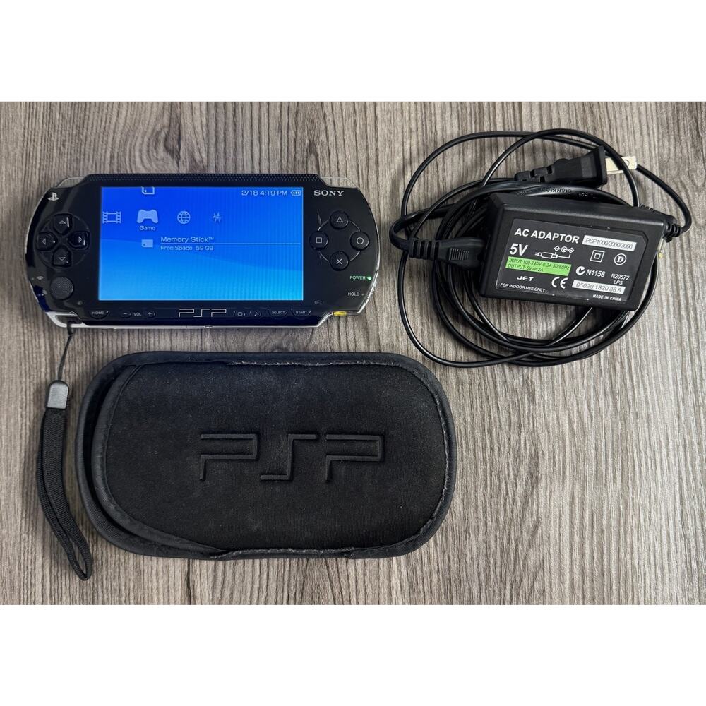 Sony PSP 1001 w/ Battery, 64GB Micro SD Card, Charger, & Carrying Sleeve